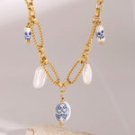 Lena – Collana in oro con pietre scintillanti.