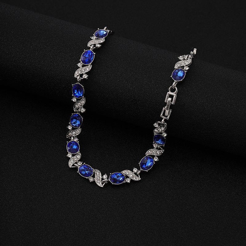 Alena – Delicato bracciale in zaffiro dalla forma circolare.