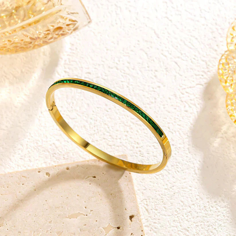 Leonora – Bracciale placcato oro con smeraldi.