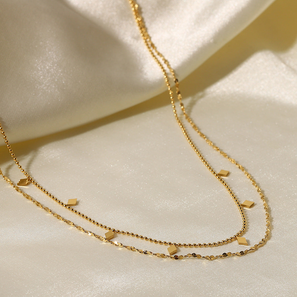 Helena – Collana dorata discreta dal fascino geometrico