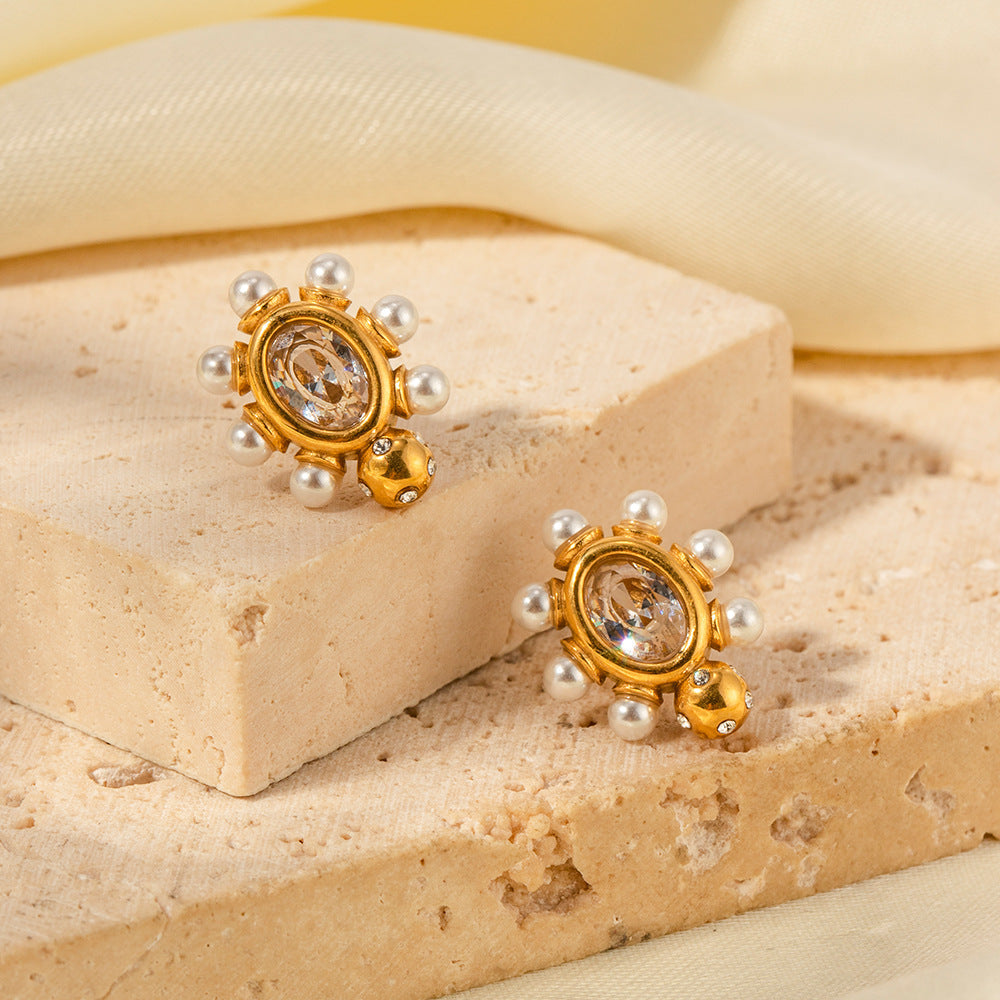Theresa – Orecchini dorati con fiori scintillanti