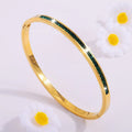 Leonora – Bracciale placcato oro con smeraldi.