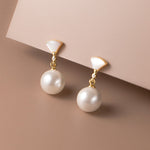 Lore – Orecchini dorati con perle