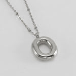 Irena – Collana dorata con charme a forma di iniziale