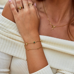 Carla – Delicato bracciale in oro con elementi rotondi a contrasto.