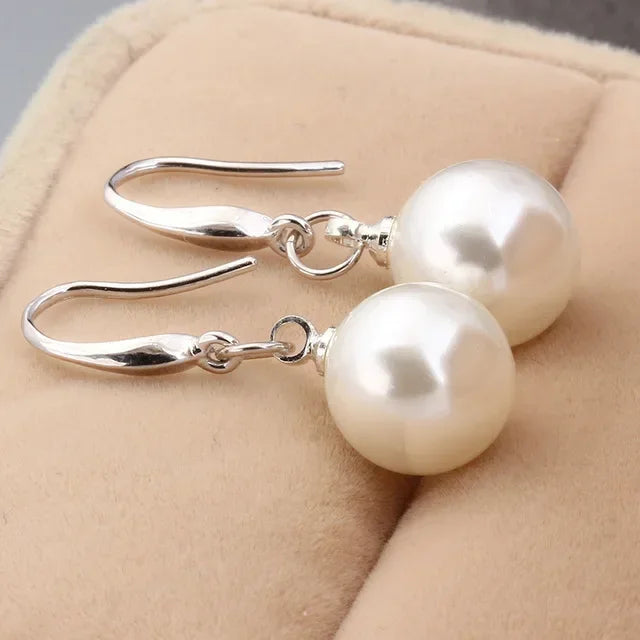 Olivia-Rose – Orecchini in oro con perle.