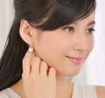 Olivia-Rose – Orecchini in oro con perle.