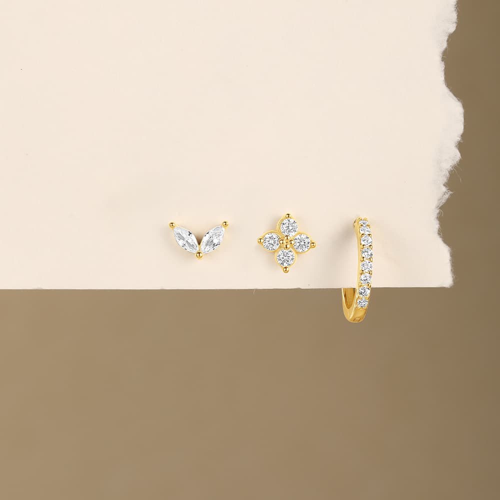 Marlena – Orecchini in oro dalla silhouette liscia.