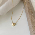 Klara – Collana dorata con pendente rotondo
