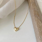 Klara – Collana dorata con pendente rotondo