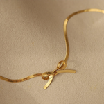 Rebecca - Collana dorata con pendente a forma di iniziale