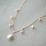 Greta – Collana dorata con piccole perline