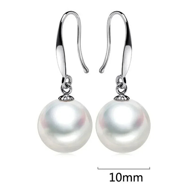 Olivia-Rose – Orecchini in oro con perle.