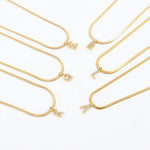 Eva – Collana dorata con pendente a iniziale