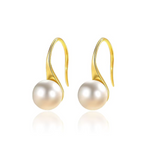 Helena – Orecchini in oro con perla ovale.