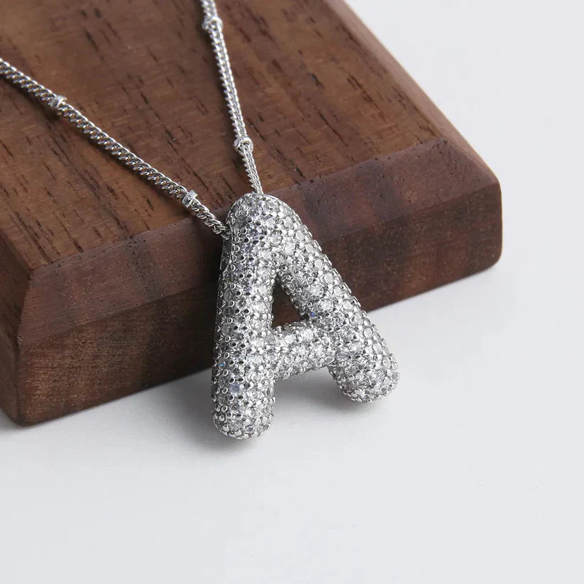Collana con ciondoli a forma di lettere