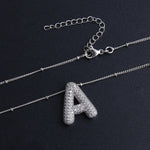 Collana con ciondoli a forma di lettere