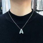 Collana con ciondoli a forma di lettere