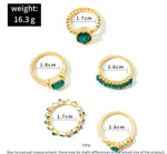 Johana – Set di anelli con smeraldo e montatura delicata.