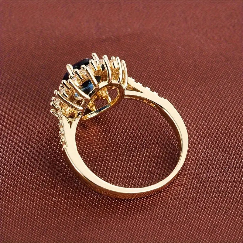 Karolína – Anello placcato oro con zaffiro floreale.