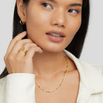 Frieda – Collana dorata con pendente curvo