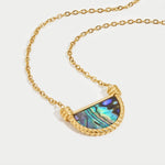 Nadja – Collana dorata con pendente in cristallo