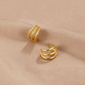 Marli – Orecchini in argento con linea chiara