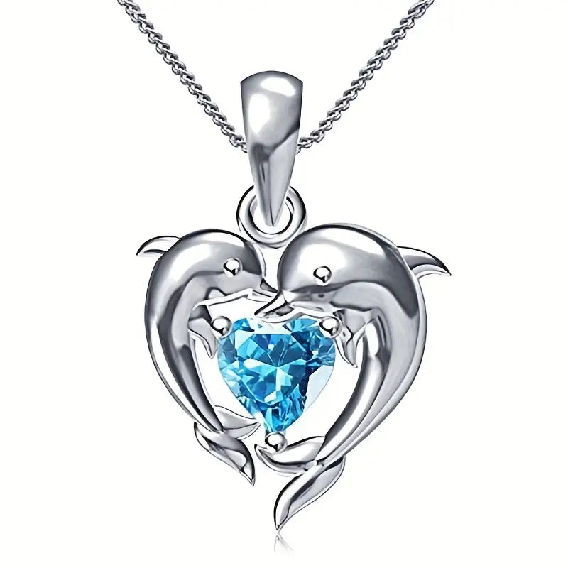 Amira – Ciondolo a forma di cuore con zaffiro.
