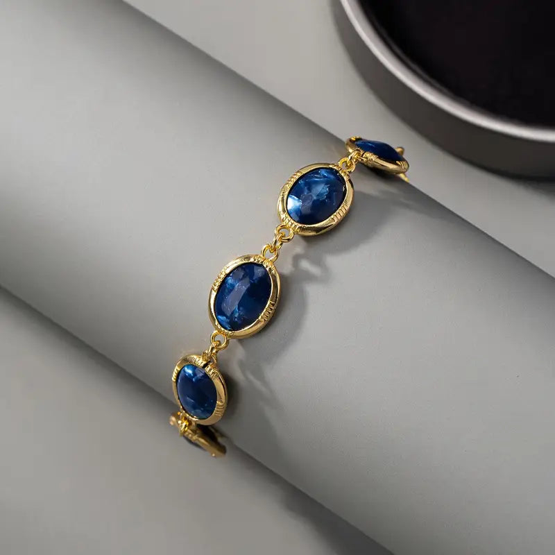 Veronika – Bracciale con pietre di zaffiro sfumate.