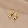 Luana – Orecchini in oro con una delicata perla.