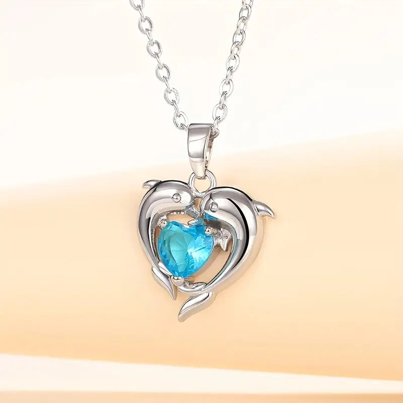 Amira – Ciondolo a forma di cuore con zaffiro.