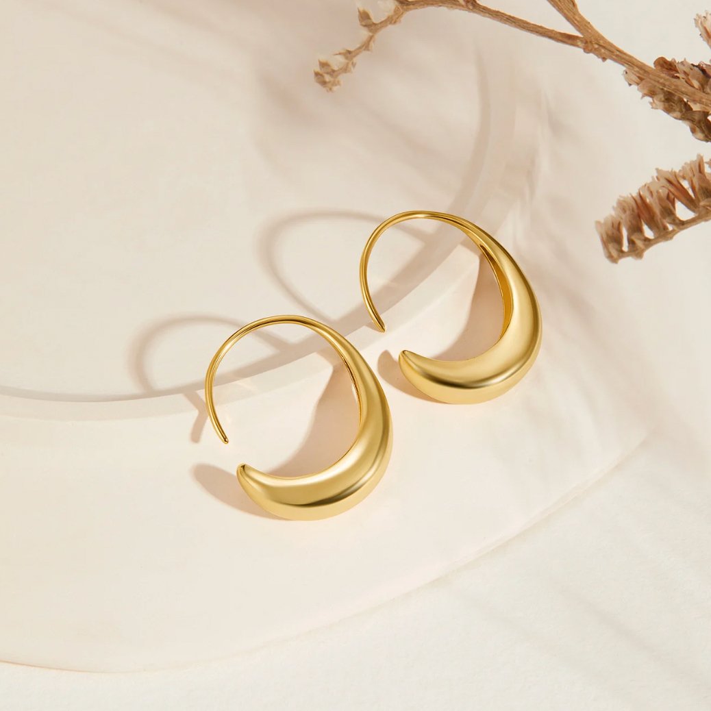 Carina – Mini cerchi dorati con una linea chiara.