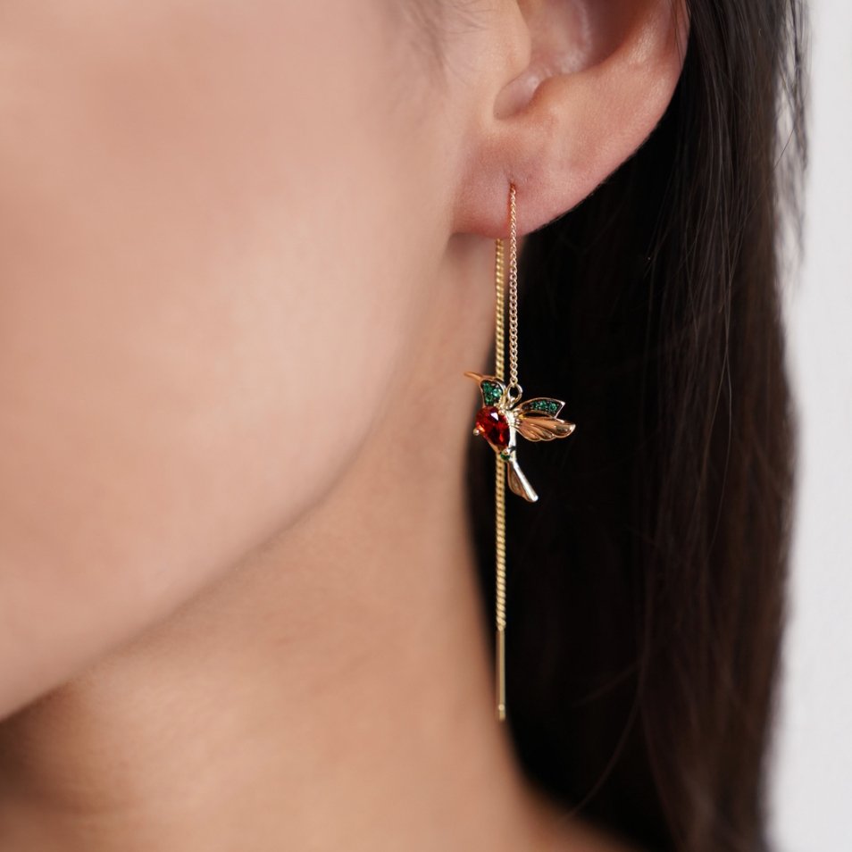 Anelli in oro con un delicato pendente