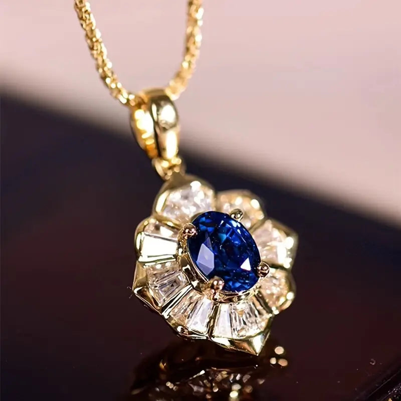 Amélie – Collana con pendente in zaffiro sfaccettato.