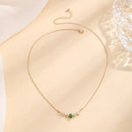 Klara – Collana doppia con pendente di smeraldo.
