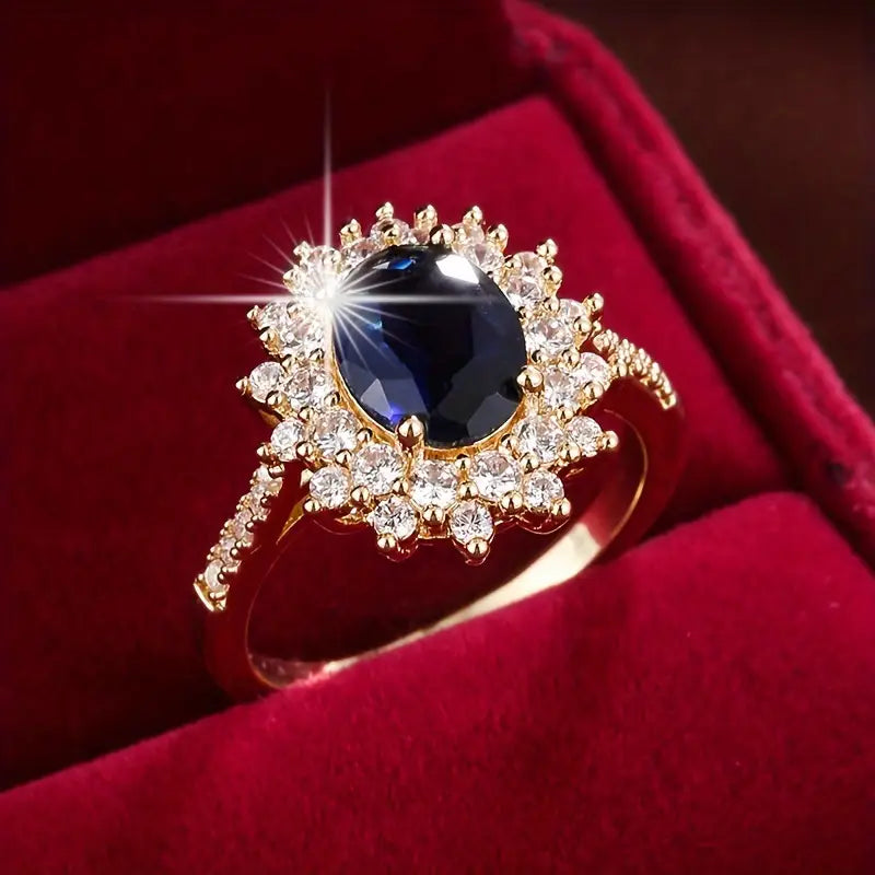 Karolína – Anello placcato oro con zaffiro floreale.