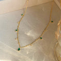 Marta – Collana in oro con pendente verde.