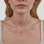 Monika – Pendente a goccia in oro caldo.