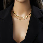 Annelie – Collana con dettagli in smeraldo e oro.