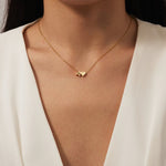 Nina – Collana dorata con disposizione a V