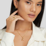 Selma – Collana dorata con pendente a forma di cuore e pietra