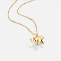 Luisa – Collana in oro con elementi floreali simmetrici.
