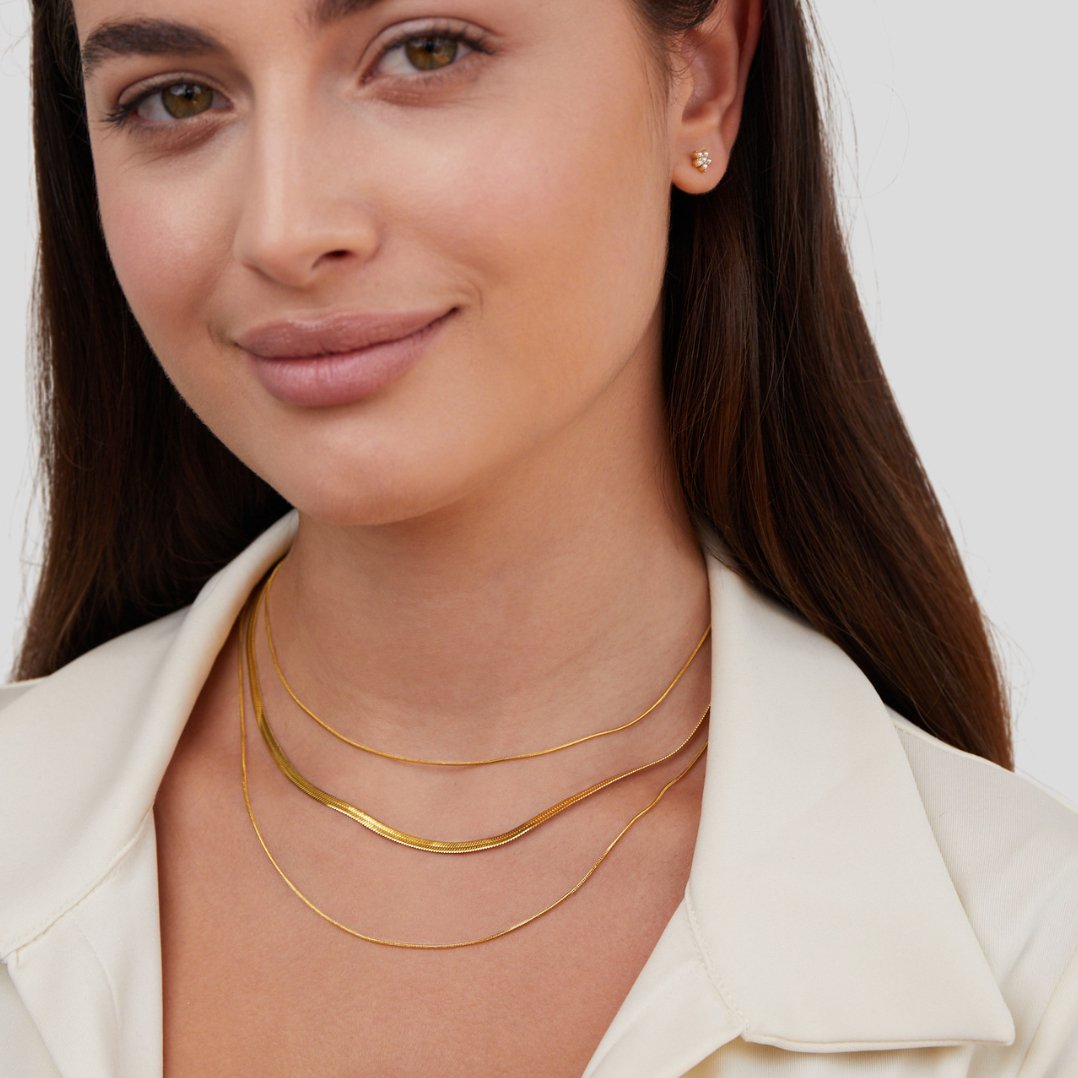 Antonie – Collana in oro multistrato dalla struttura trasparente.