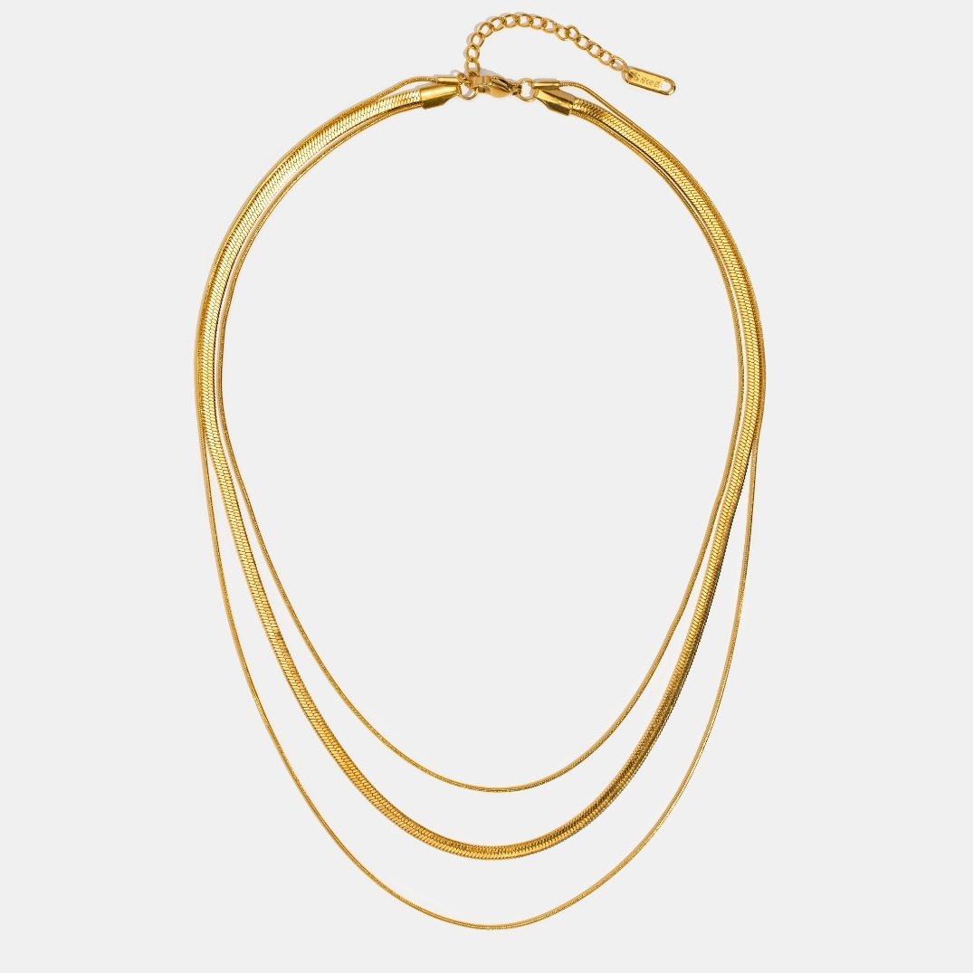 Antonie – Collana dorata multistrato con struttura chiara