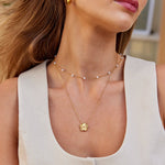 Isabell – Collana dorata rotonda con delicato pendente