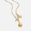 Anja – Collana dorata con decorazione in perla