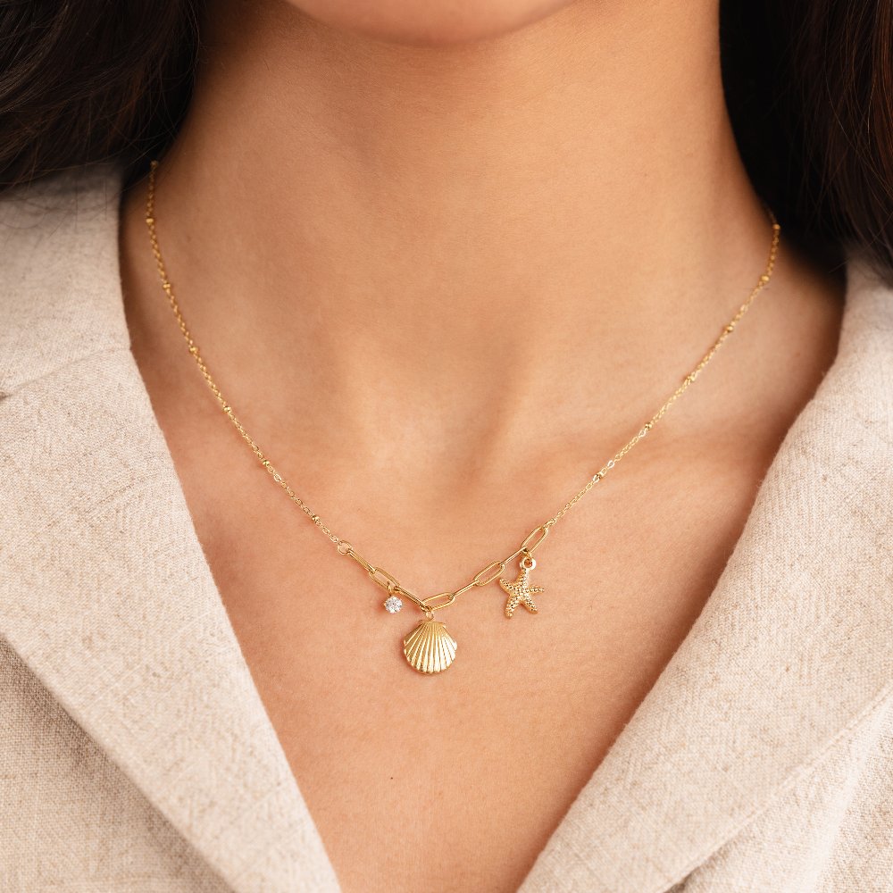 Anja – Collana dorata con decorazione in perla