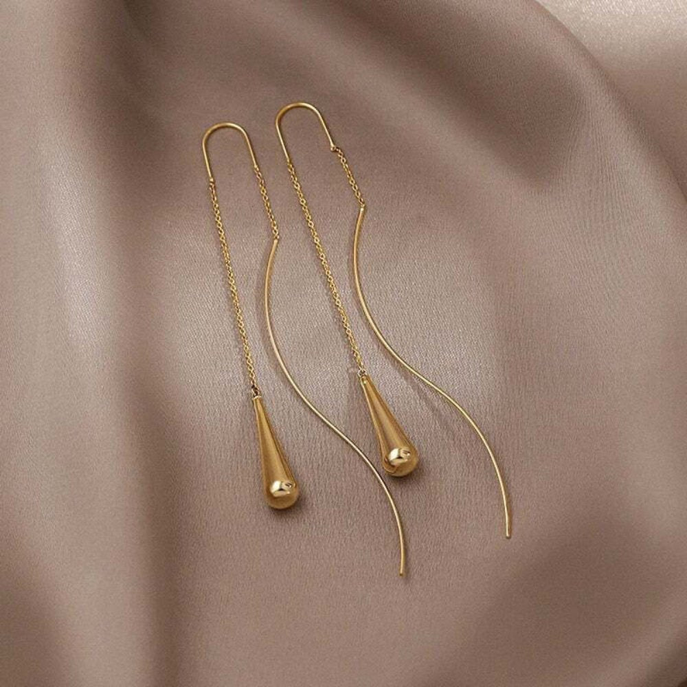 Felicie – Orecchini in oro con piccoli borchie.