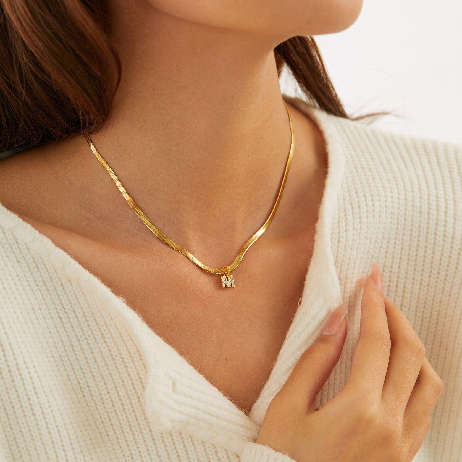 Eva – Collana dorata con pendente a iniziale