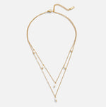 Tanja – Collana a strati in oro con maglia moderna.